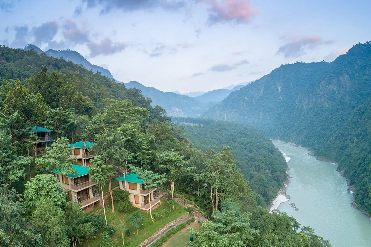 Atali Ganga cottages set into the forested hillside